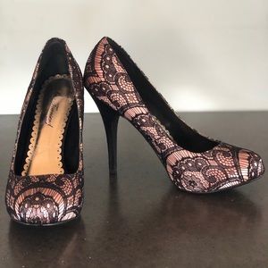 Black and pink lace pumps
